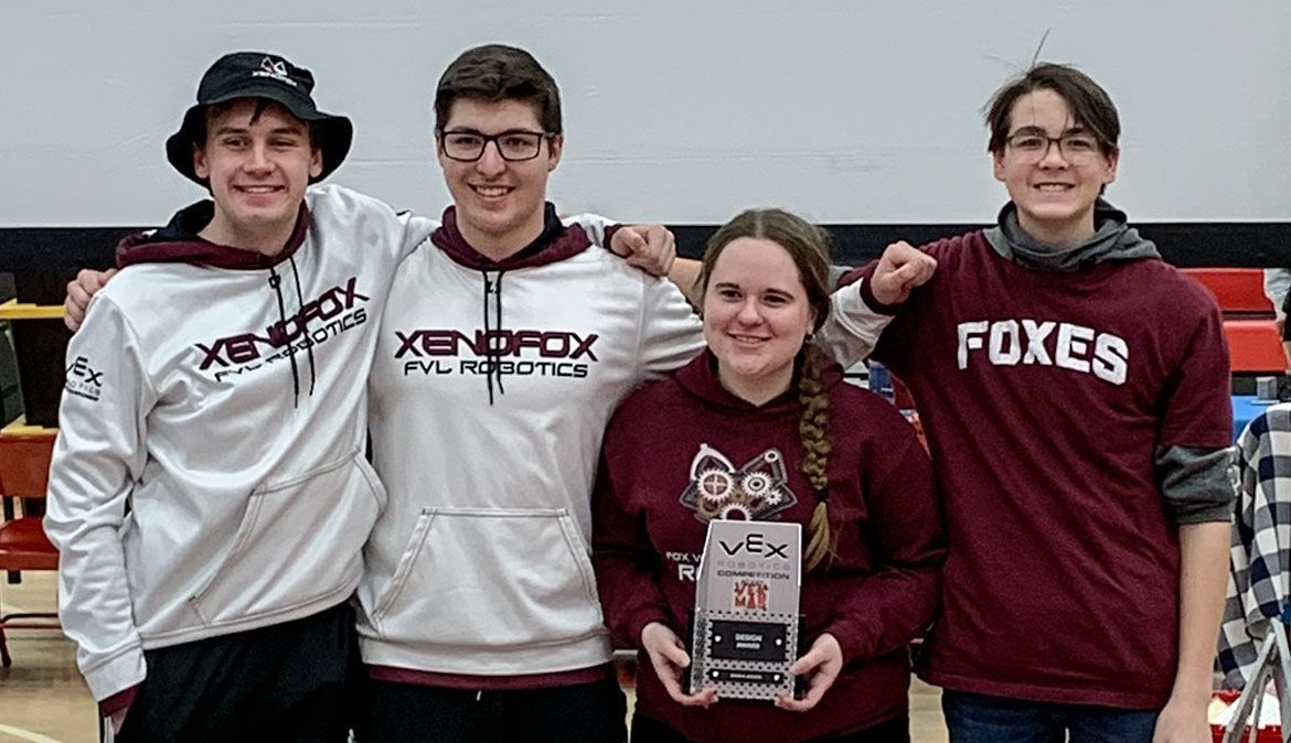 VEX Team 5062X holding a trophy