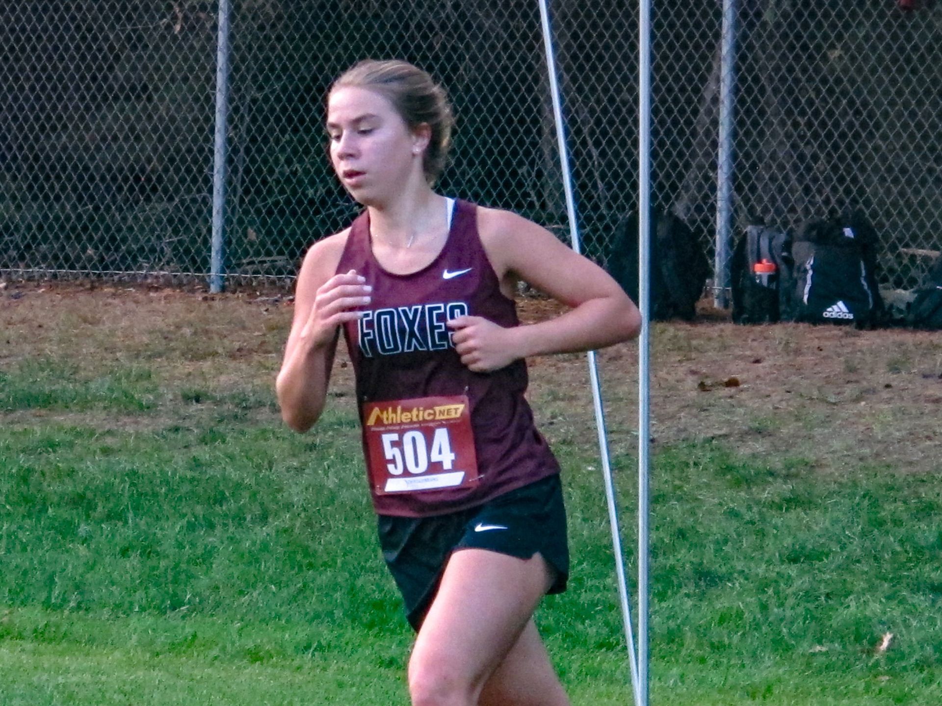 Kristen Donart, running a cross country race
