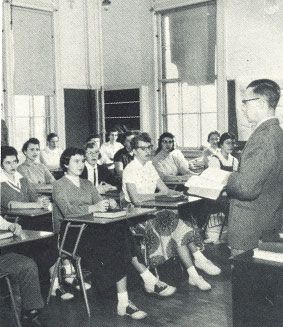 Male teacher in front of a classroom of students in the Jefferson School, in the 1950s