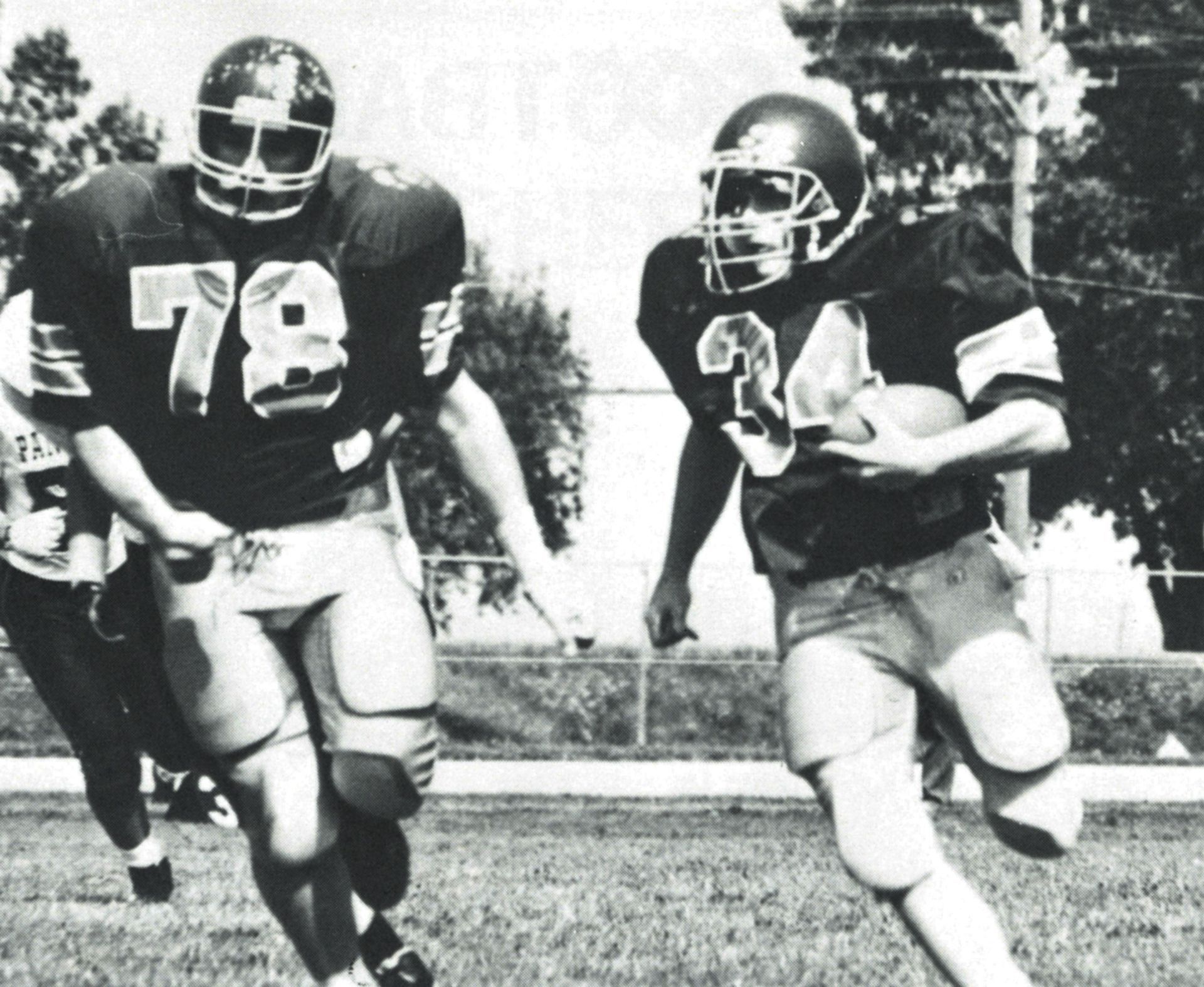 Vintage black and white photo of FVL football players