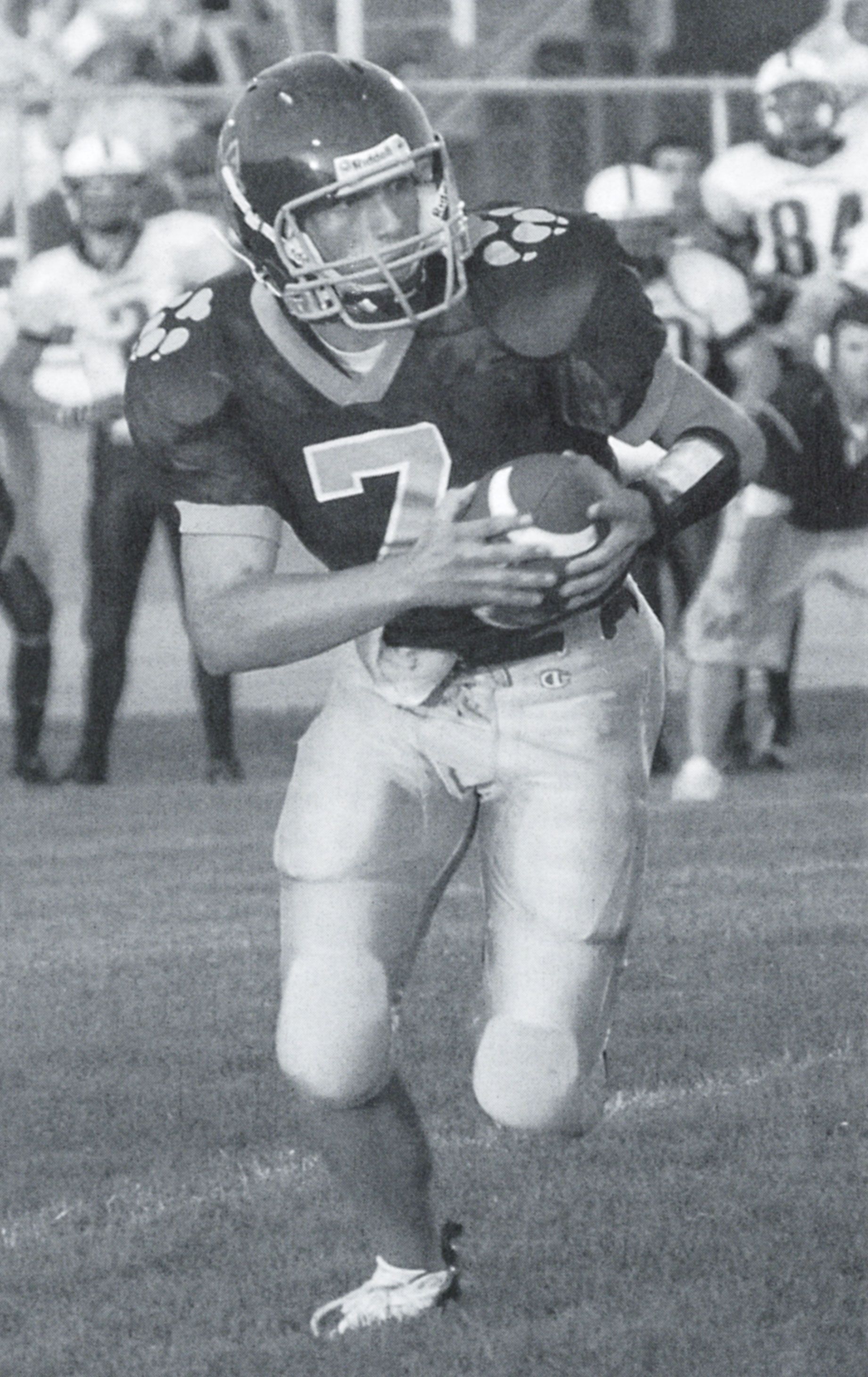Player holding and protecting the ball