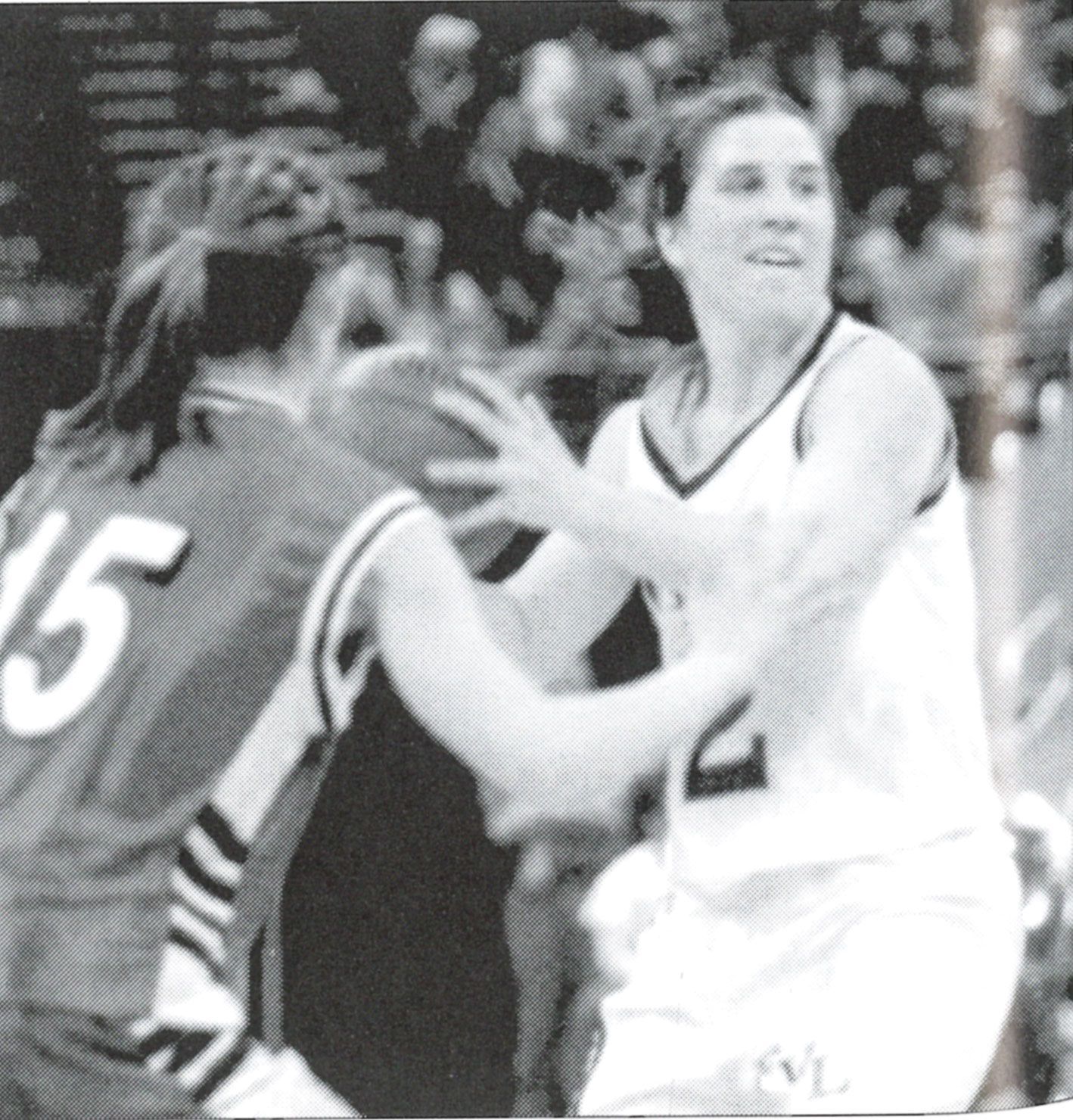 Old yearbook photo of Rachel playing at the Kohn Center
