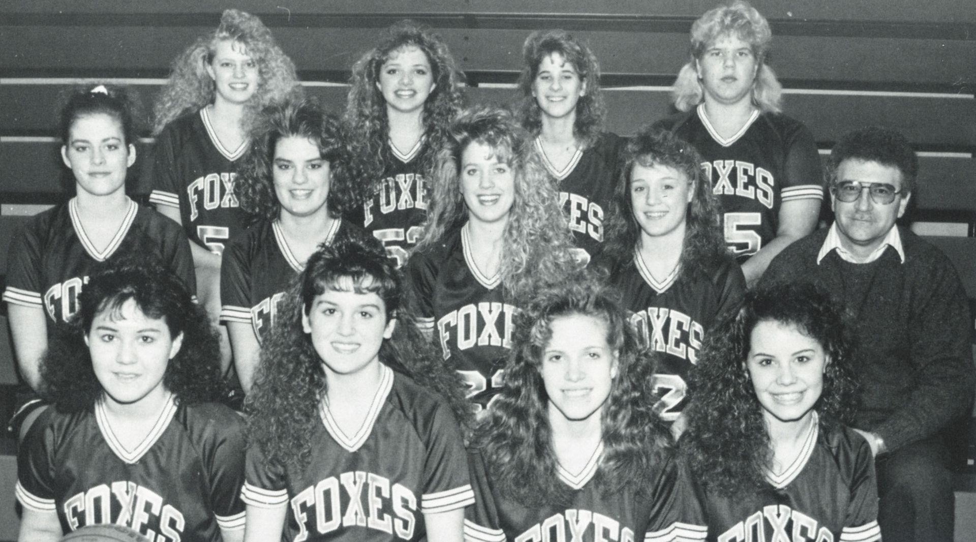 Girls basketball team with coach