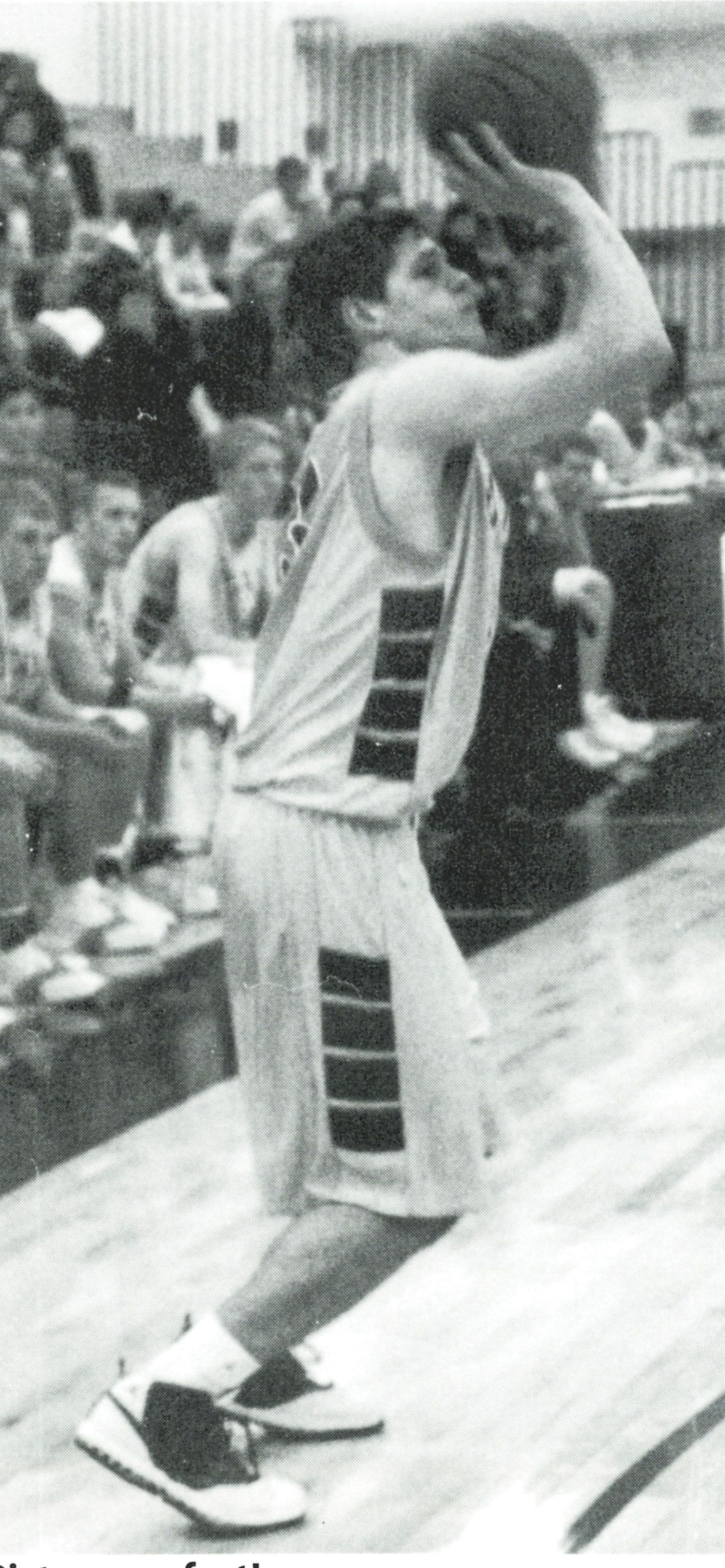 Male basketball team member ready to shoot for a basket 