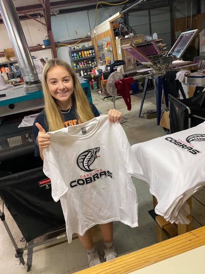 Woman holding a white