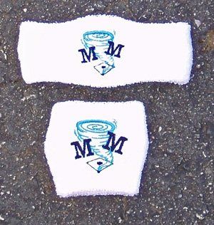 White wristband and headbands with a blue tornado logo and 