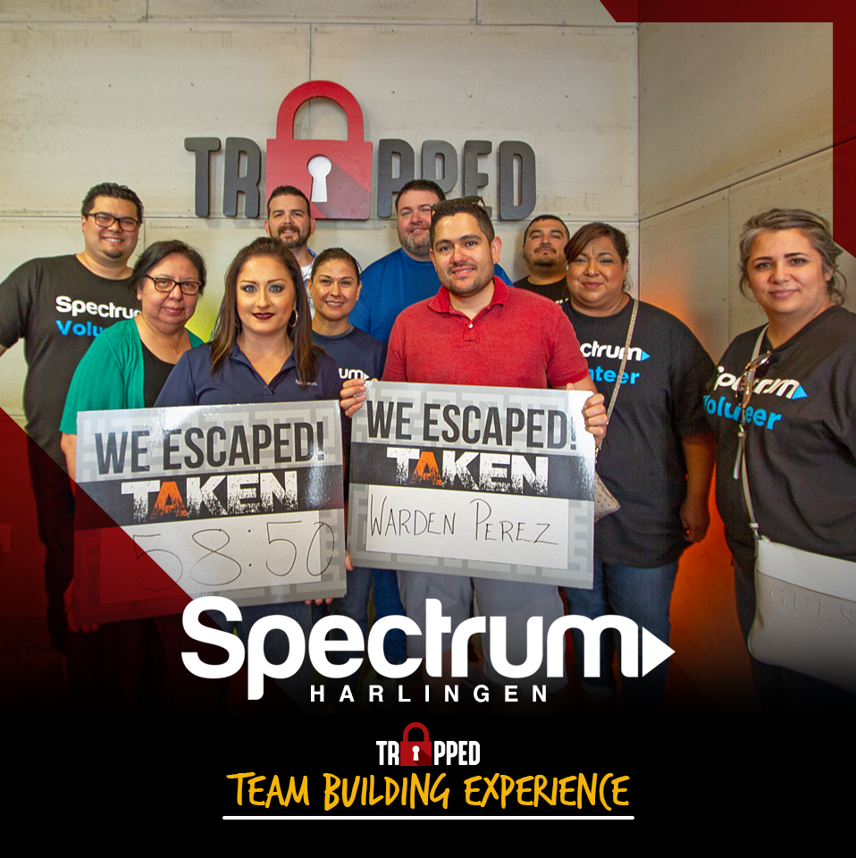 A group of people holding signs that say we escaped taken