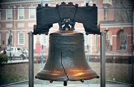 Liberty Bell, cracked, in a glass display case at Independence Hall, Philadelphia.