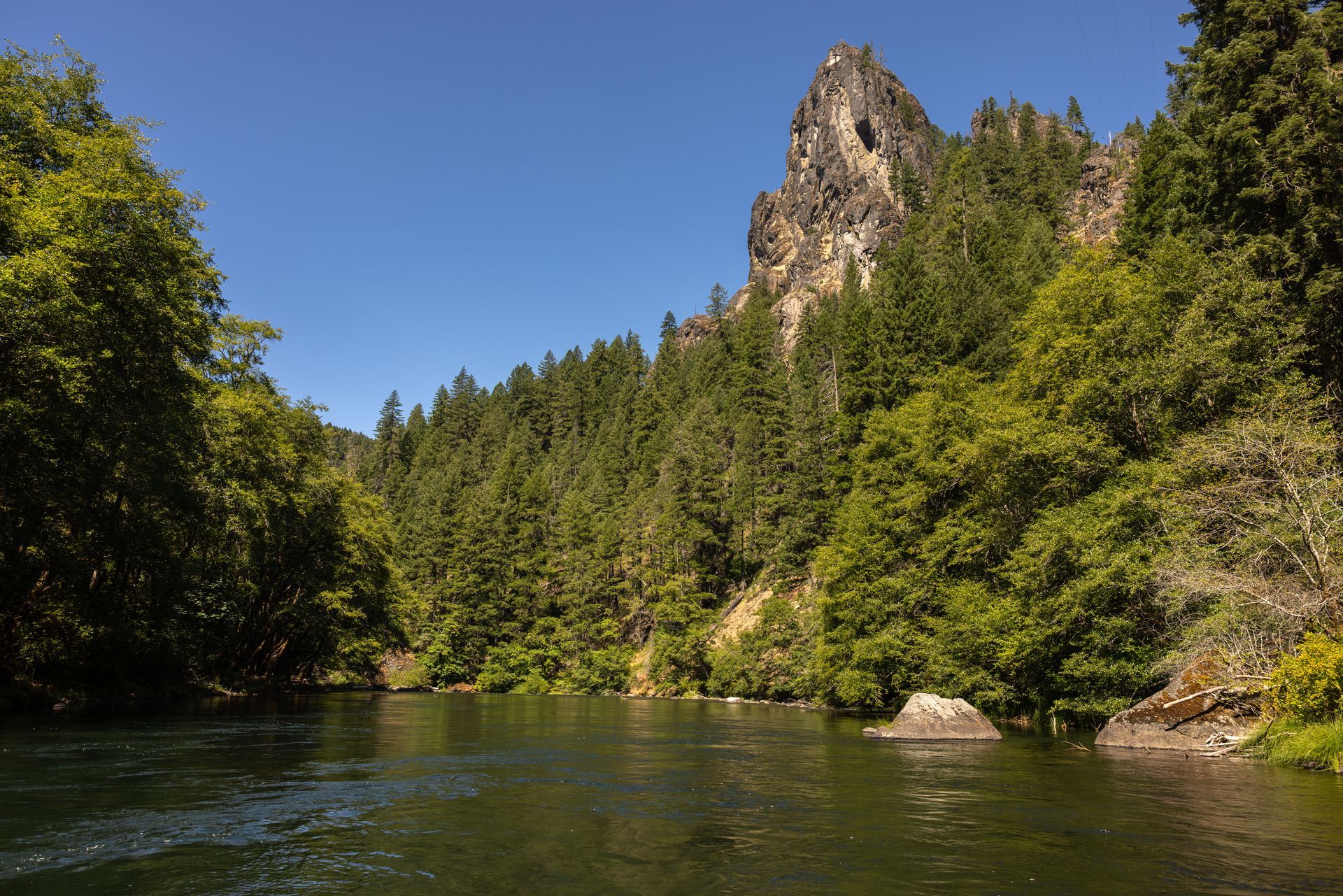 The exciting North Umpqua River is a scenic outdoor adventure near Bend, Oregon, with a beautiful river canyon.
