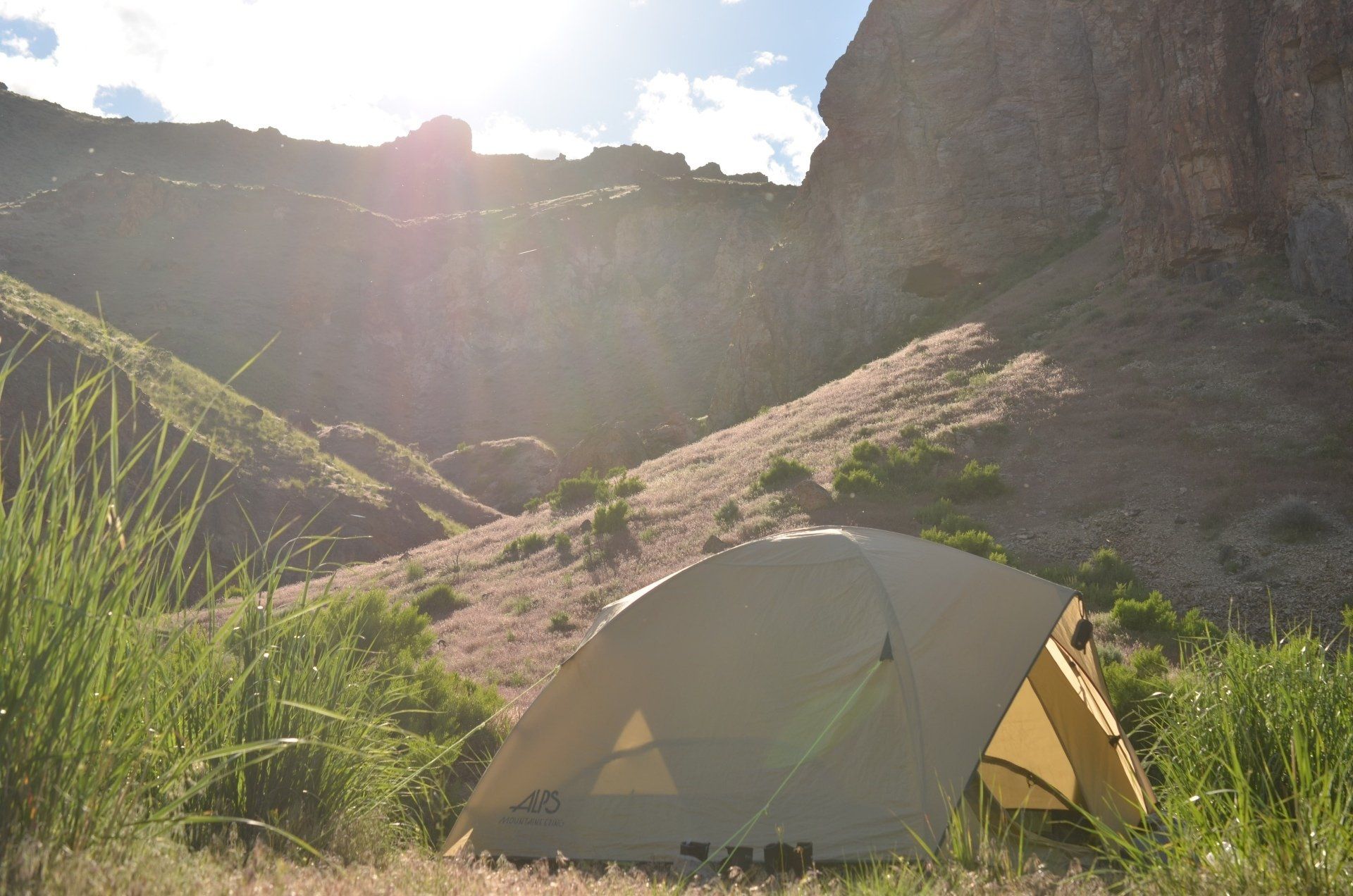 A tent perched with a dramatic canyon view on the Owyhee River.