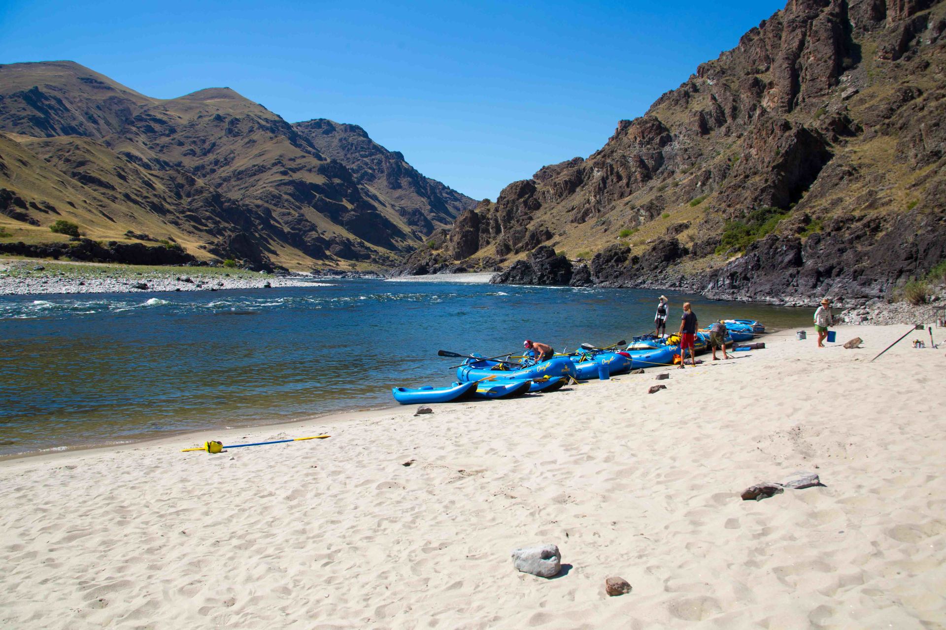 Salmon River rafting adventures are known for gorgeous white-sand beaches and warm water.