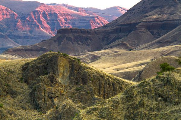 The Lower Salmon River winds through a deep, impressive canyon with rock walls and valley deposits.