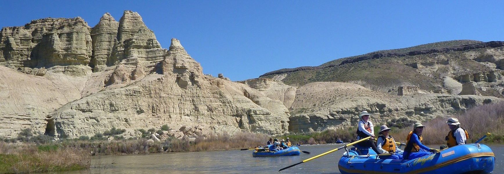 A riverside camp scene