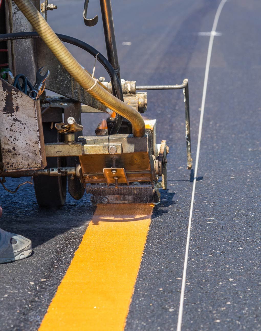 A Machine is Painting a Yellow Line on the Road — RPS–Remote Painting Services in White Rock, QLD