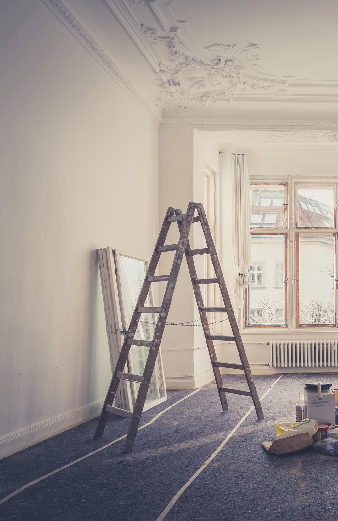 A Wooden Ladder is Sitting in a Room Next to a Window — RPS–Remote Painting Services in White Rock, QLD