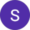 The letter s is in a purple circle on a white background.