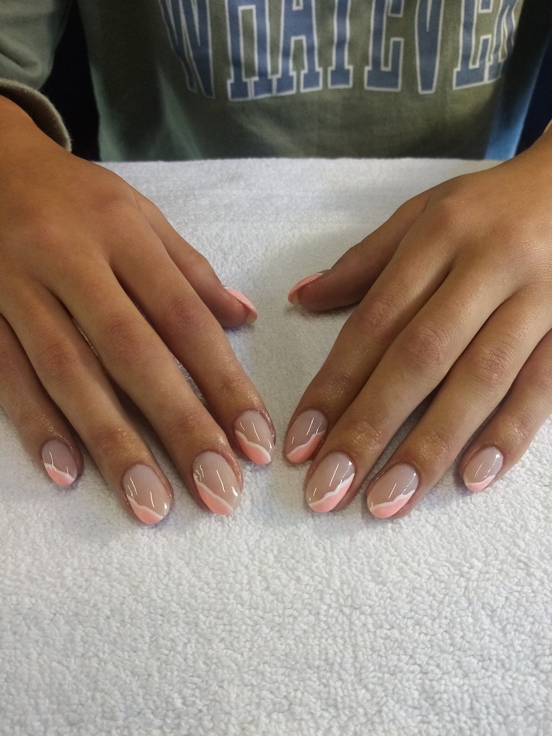 A person wearing a shirt that says whatever on it