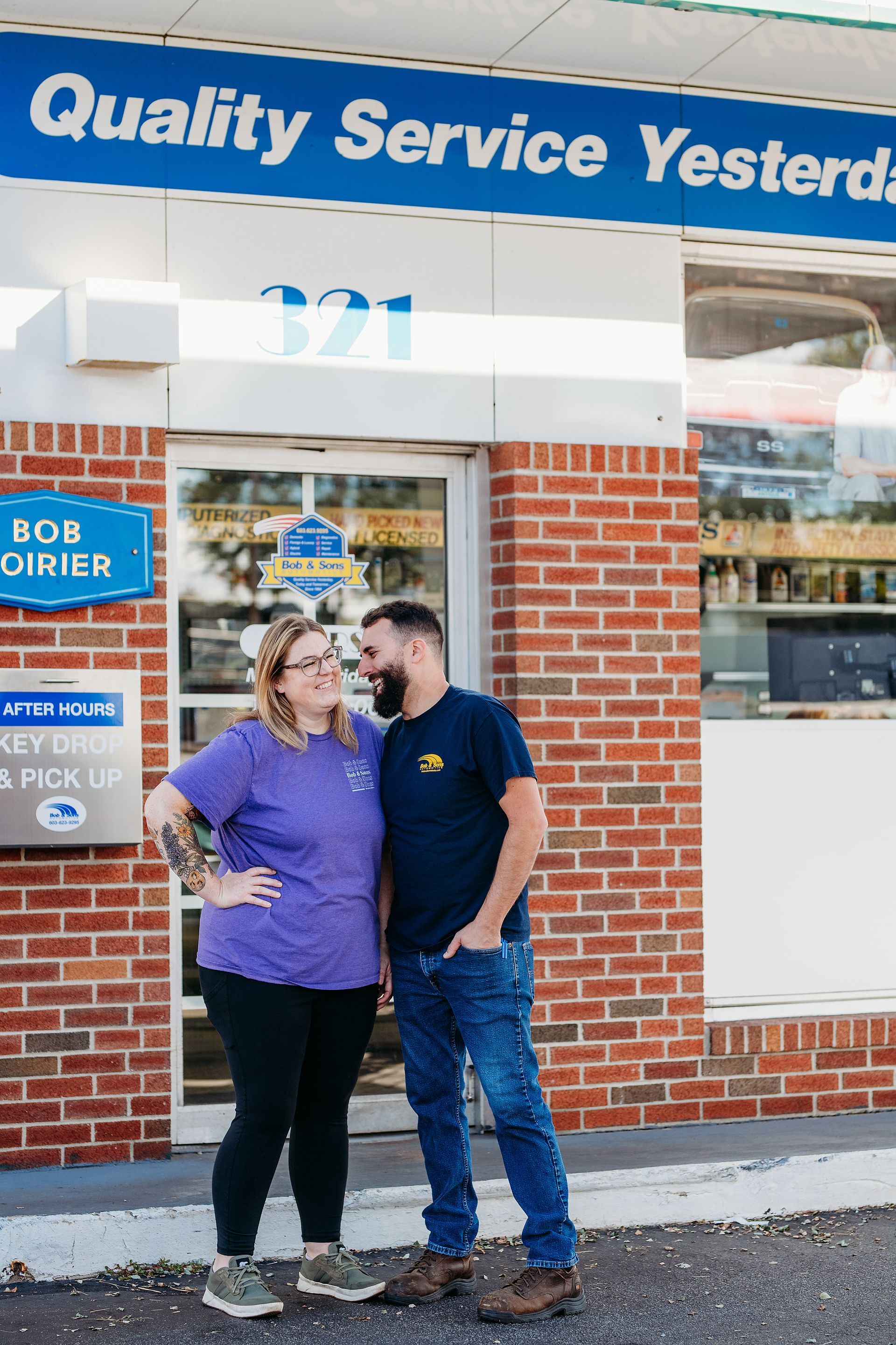 mechanics standing in shop | Bob and Sons Automotive