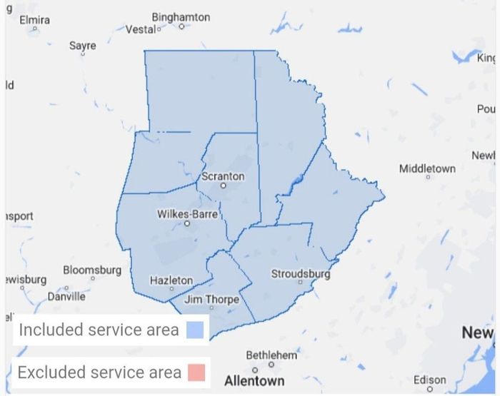 A map showing a service area and an excluded service area