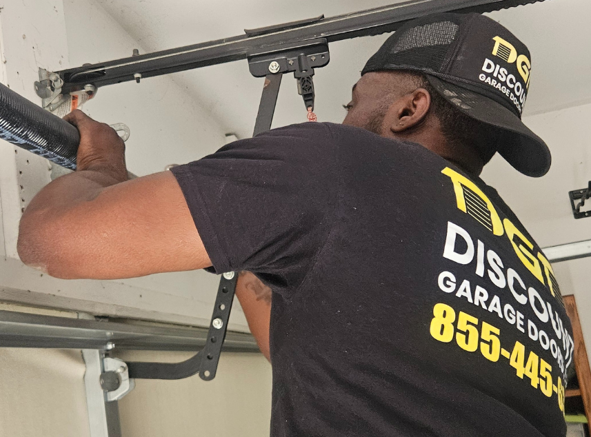 discount garage doors llc tech randy repairing garage door torsion  spring in scranton pa