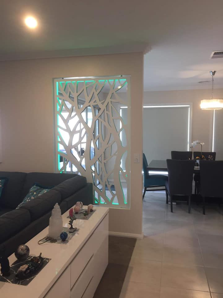 A Living Area Featuring A Couch, With A Dining Room Visible In The Background – Horsham, VIC - ALK Property Maintenance