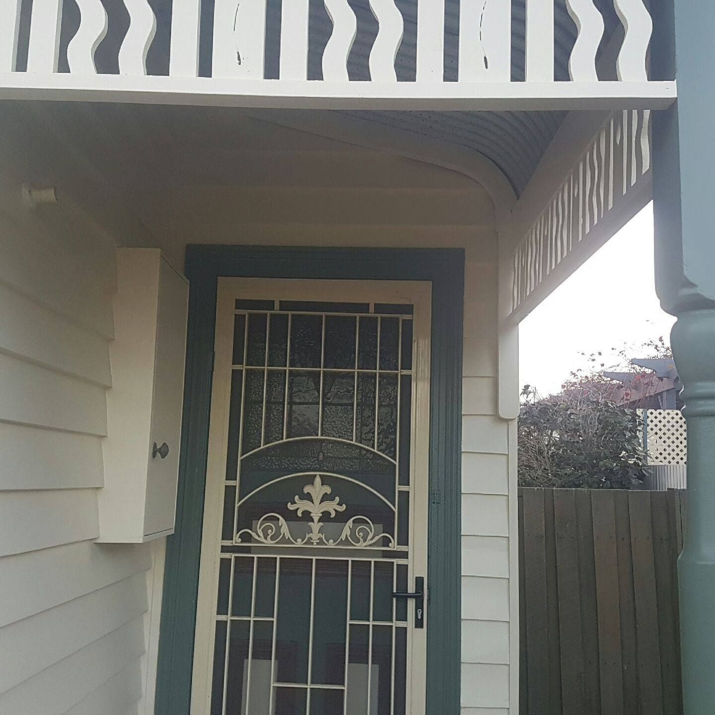 The Front Door Of A House Has A Wrought Iron Gate – Horsham, VIC - ALK Property Maintenance