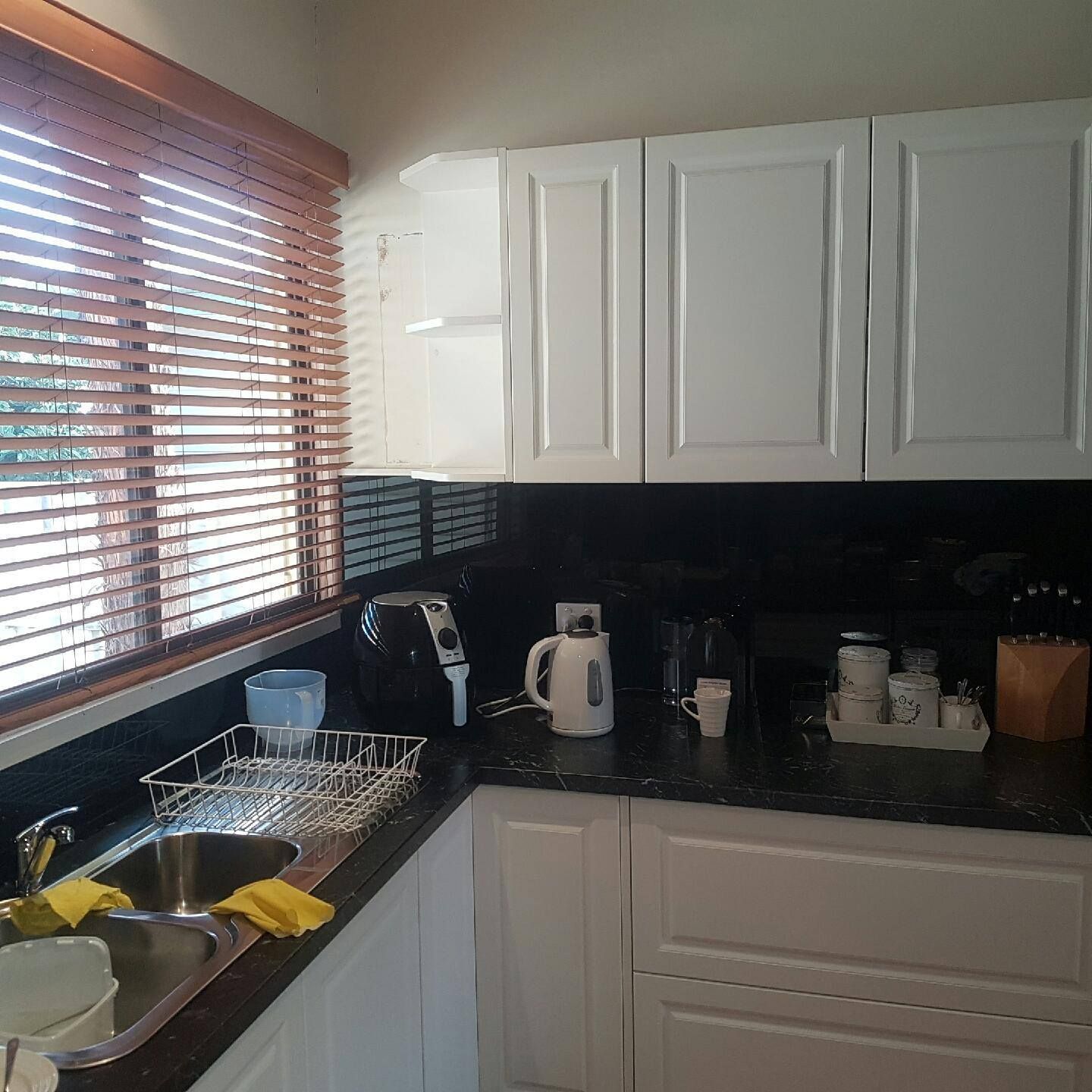 A Kitchen With A Sink And A Window With Blinds – Horsham, VIC - ALK Property Maintenance