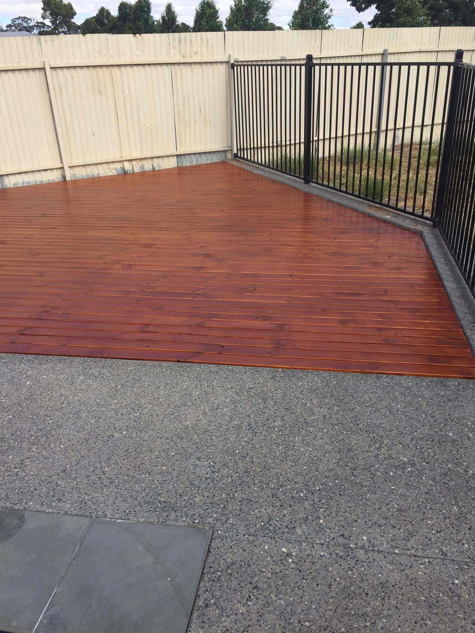 A Wooden Deck With A Fence In The Background – Horsham, VIC - ALK Property Maintenance