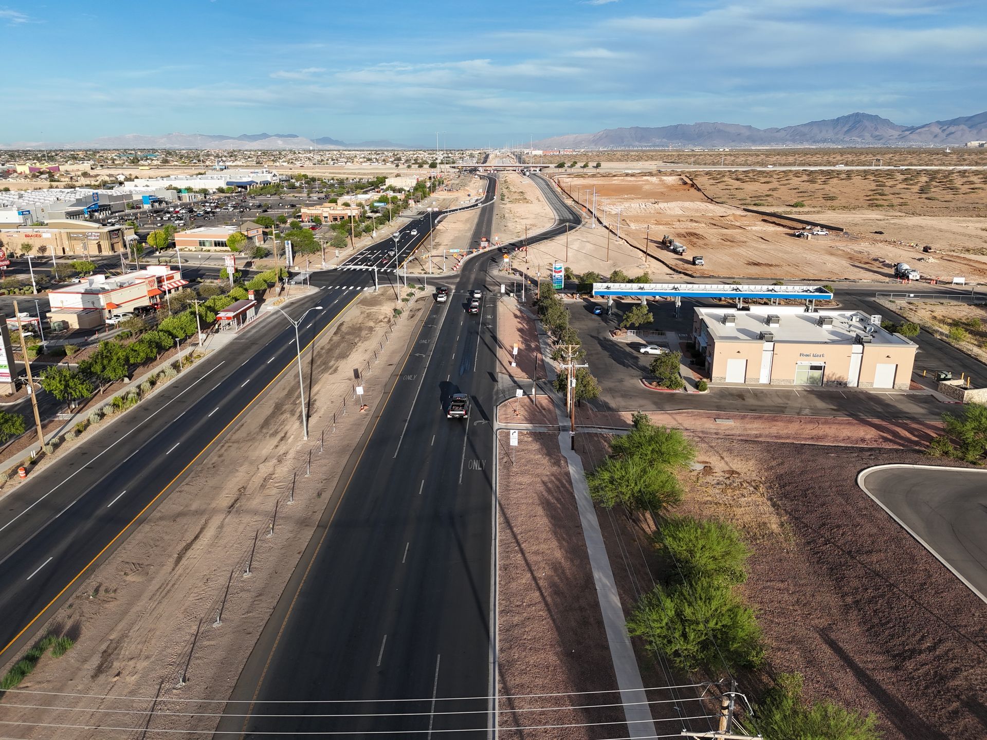 An aerial view of a highway in the desert