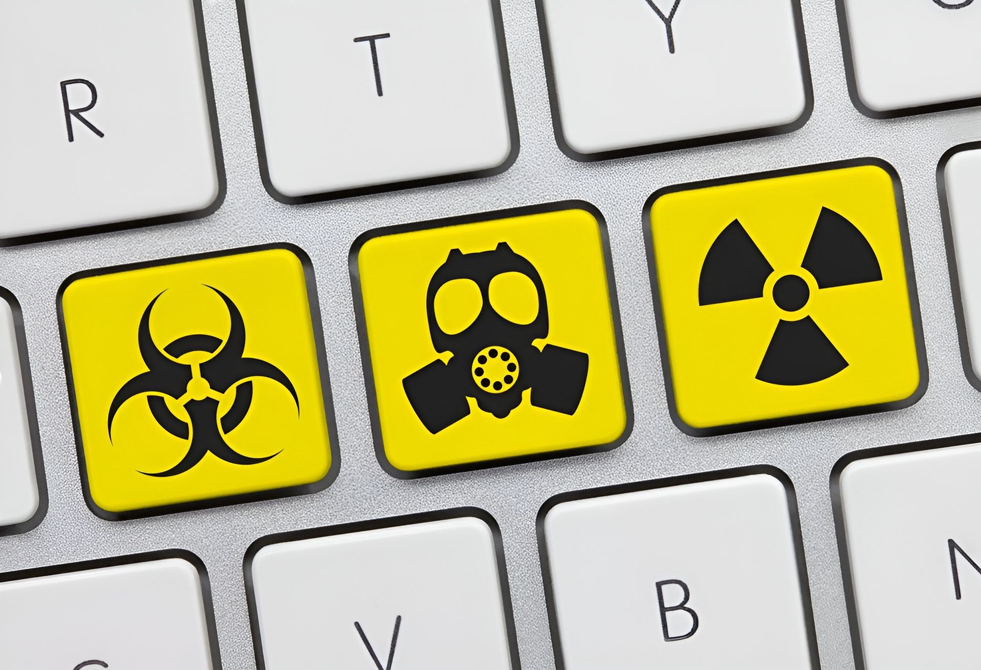 A set of four warning signs including a skull and crossbones , a radioactive symbol , and a biohazard symbol