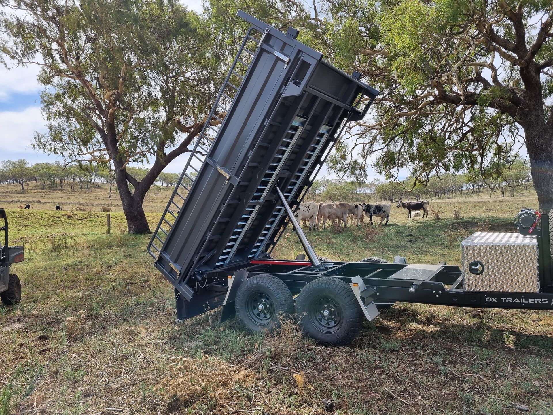 Rear Tipper Trailer with hi-volume extender Dropsides and tandem axles with Maxxis Razr All Terrain Tyres.