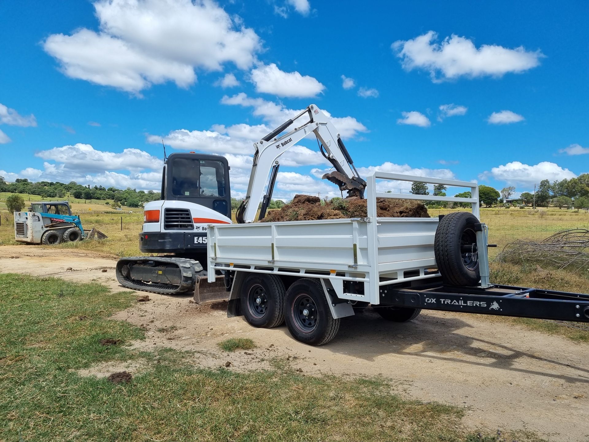 4.2m x 2.3m Rear Tipper Trailer at Farm with Excavator