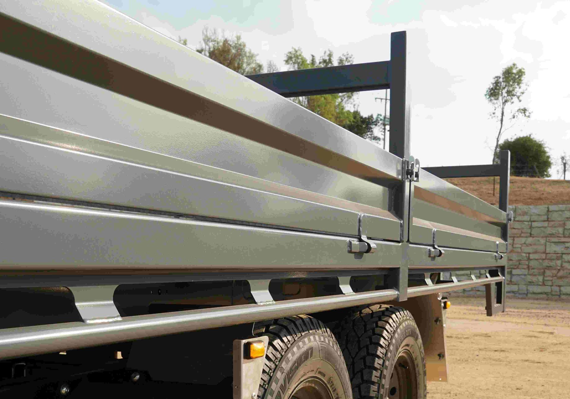 A standard ox trailer 250mm high dropside on a flat top trailer.