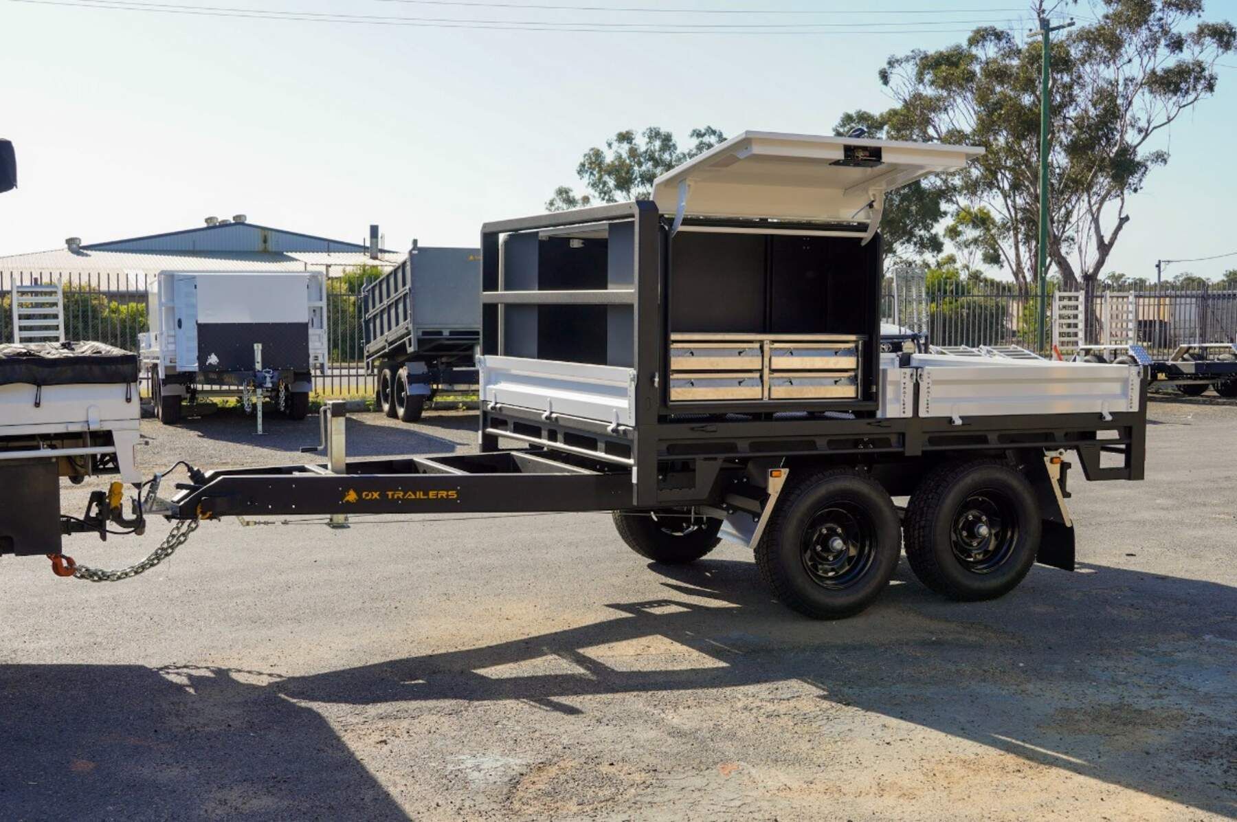the three removable ladder racks on the 6m long tray of an ox flat top trailer.
