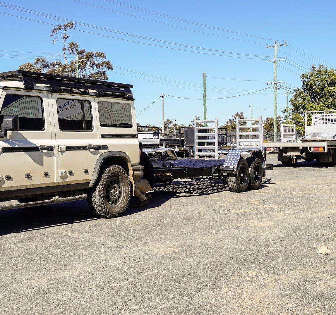 heavy duty plant trailer for mower and excavator for horticultural business.