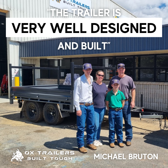 Michael Bruton and his family with his tipper trailer