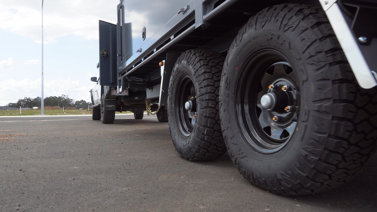 Maxxis Razr tyres on a dual axle flat top trailer built by ox trailers for rural construction industry.