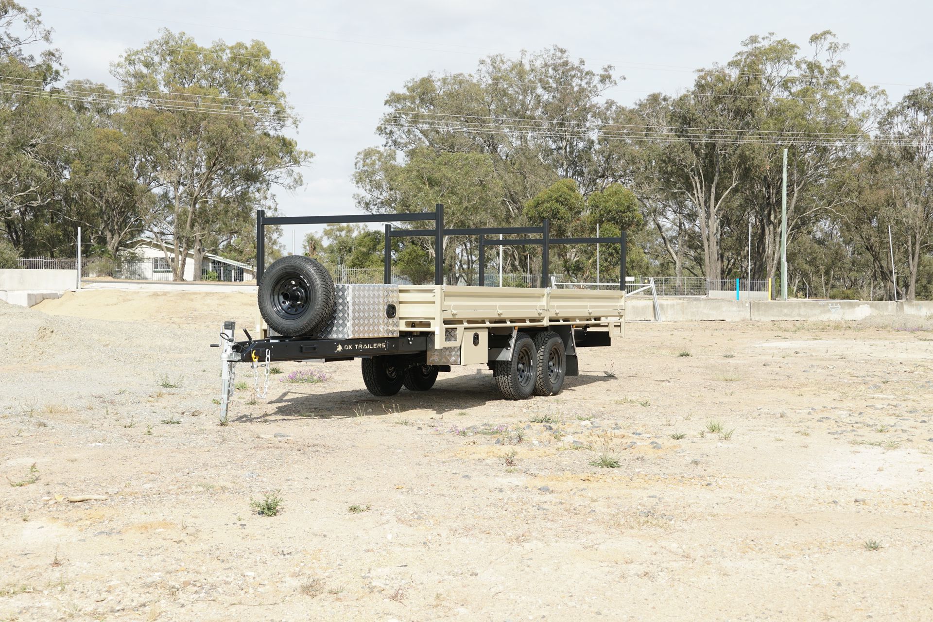 An Ox Flat Top Trailer at a construction site