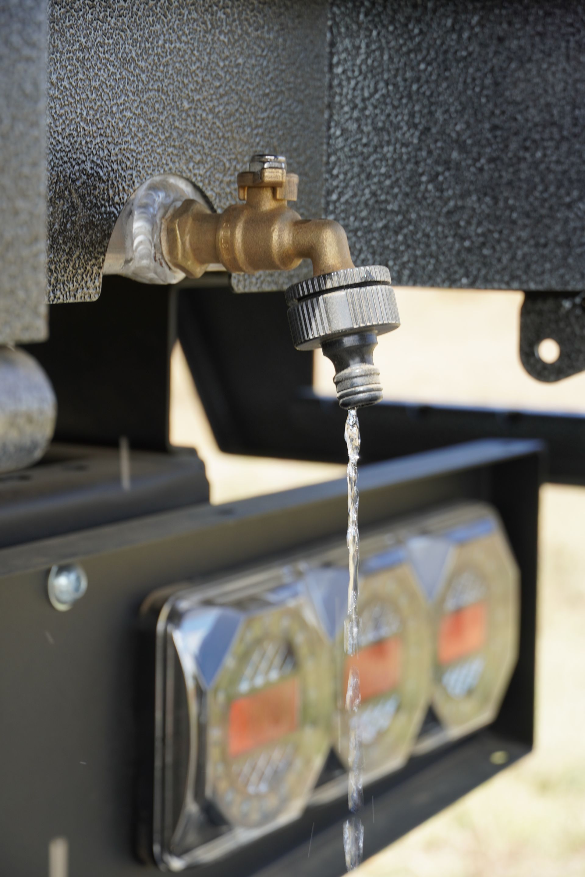 One of the two 150L Water tanks on Tom Clarke flat top trailer, these are located at the rear of the trailer.