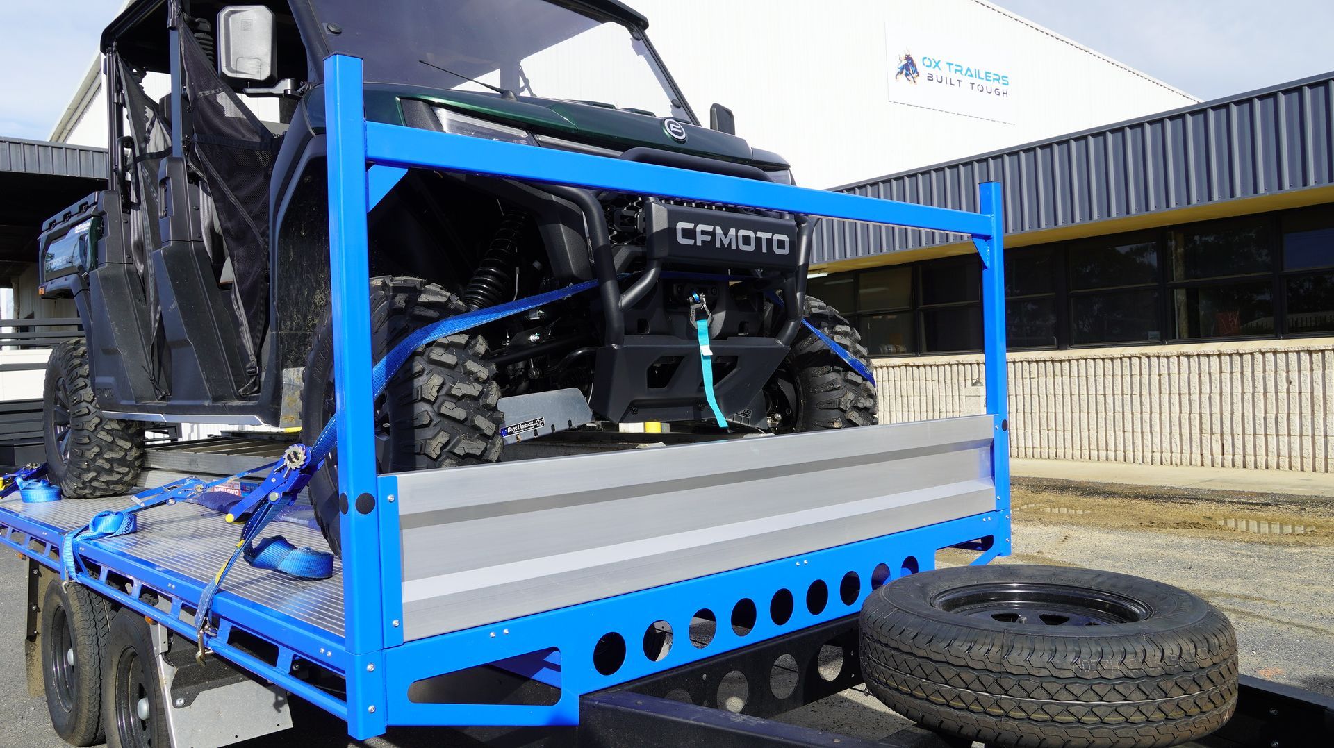 Heavy duty front headboard of ox flat top trade series trailer, blue RHS with Aluminium extrusion dropside.