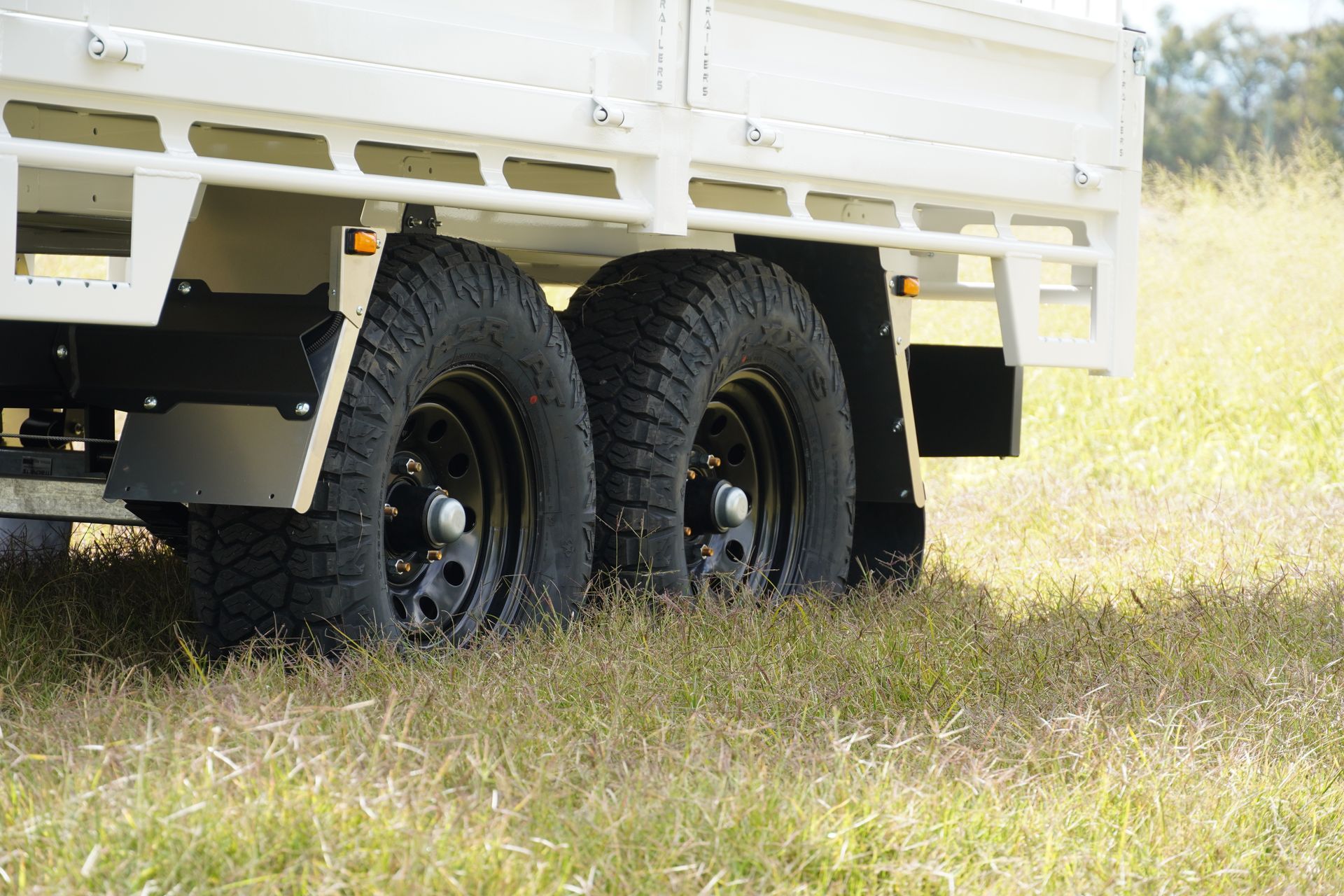 The maxxis razr tyres of the Station Creek Tree Farm 3.5t atm Flat top trailer.