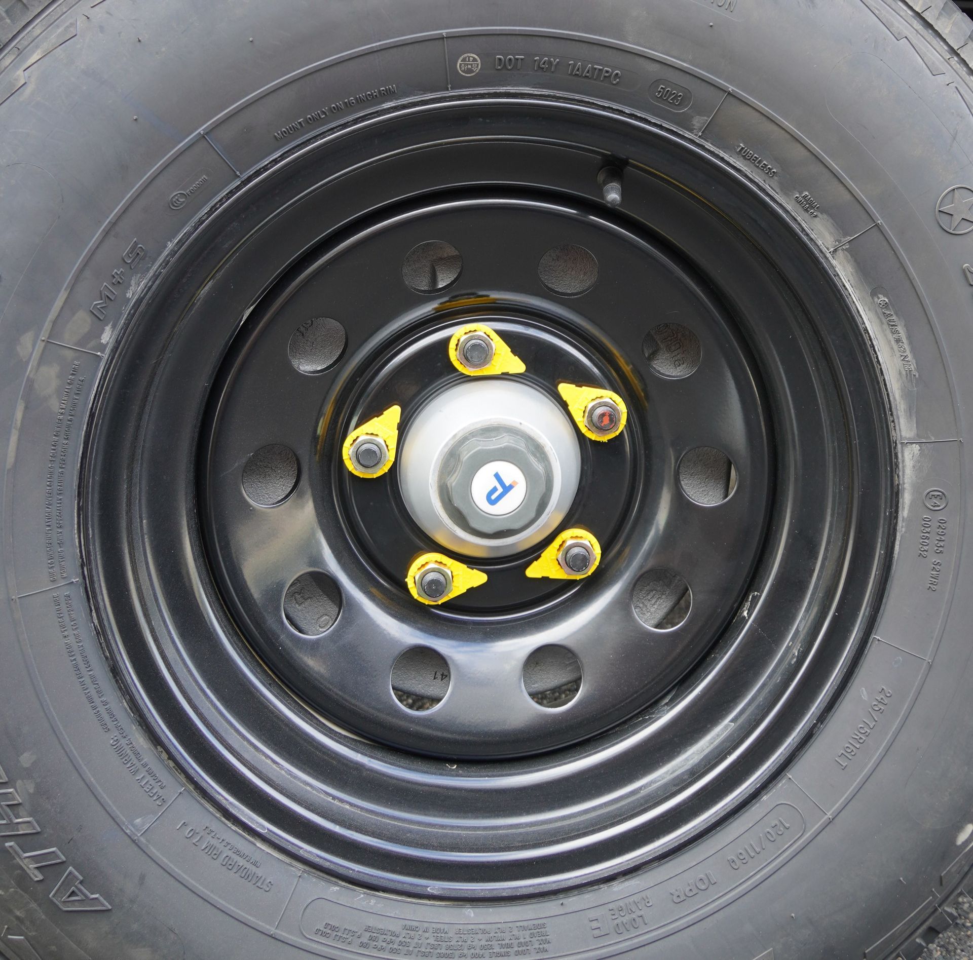 The 12-inch electric drum brake visible through the wheel rim of an Ox Trailer tyre on a Service Trailer