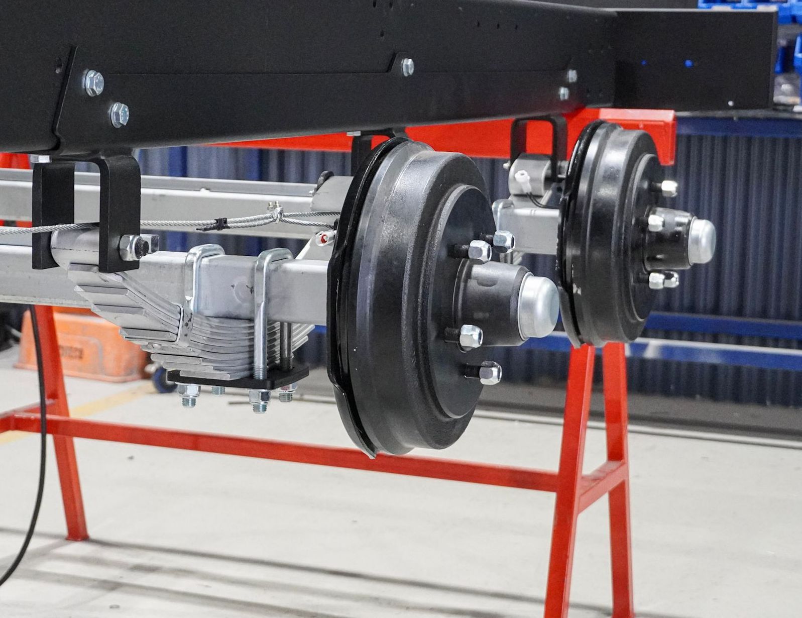 The 10-inch electric drum brake visible through the wheel rim of a tyre on a Flat Top Trailer