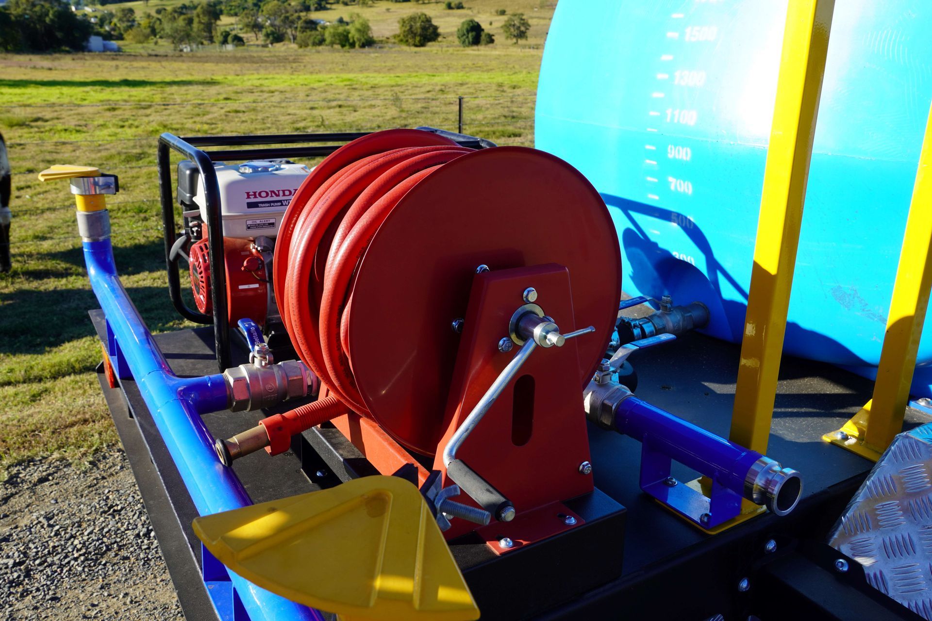 The 30m long, 19mm fire hose and holder as it sits on the rear of the trailer.