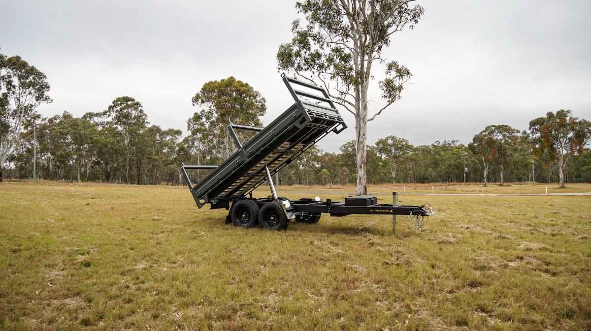 4.2m x 2.1m rear tipper trailer at a quarry with Maxxis Razr Tyres, headboard, toolboxes, and colour upgrade.