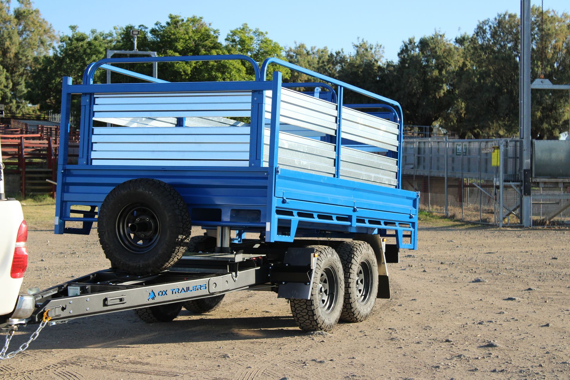 A Tipper Trailer with a sheep crate attachment. The sheep crate can be craned off or lifted on by a forklift.