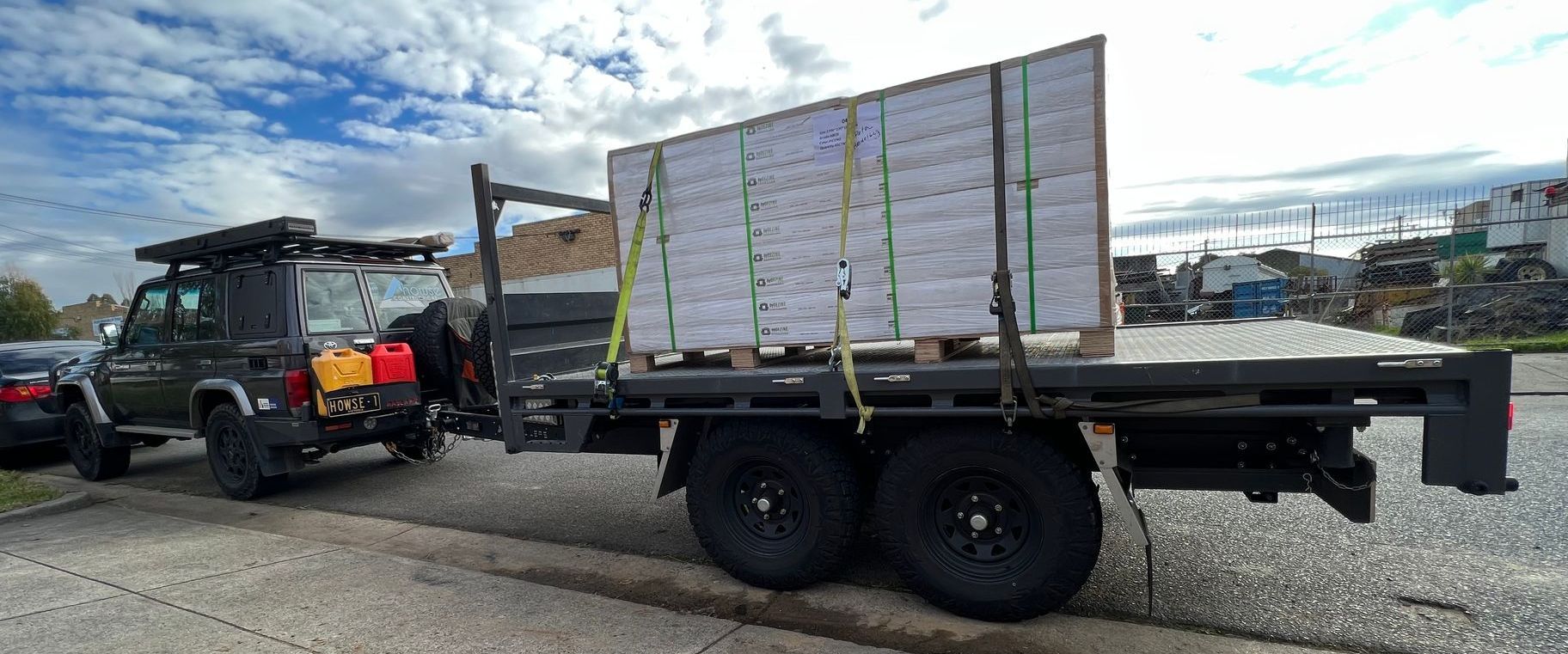 A Tipper trailer carrying a pallet of concrete to a construction site for Howse Constructions