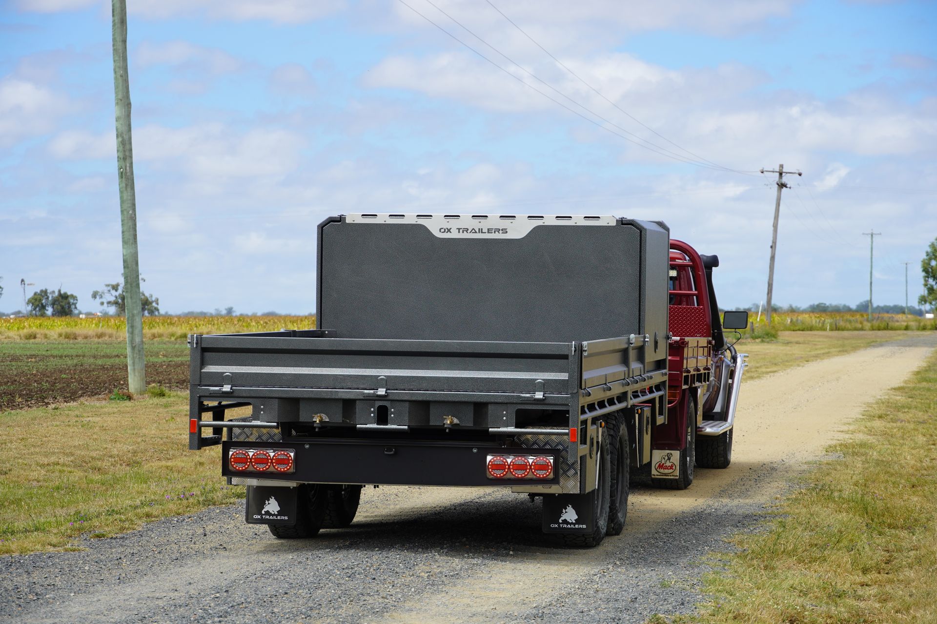 Back view of tom clarkes 3.5t atm flat top trailer, highlighting the maxi lamp tail light accessory.