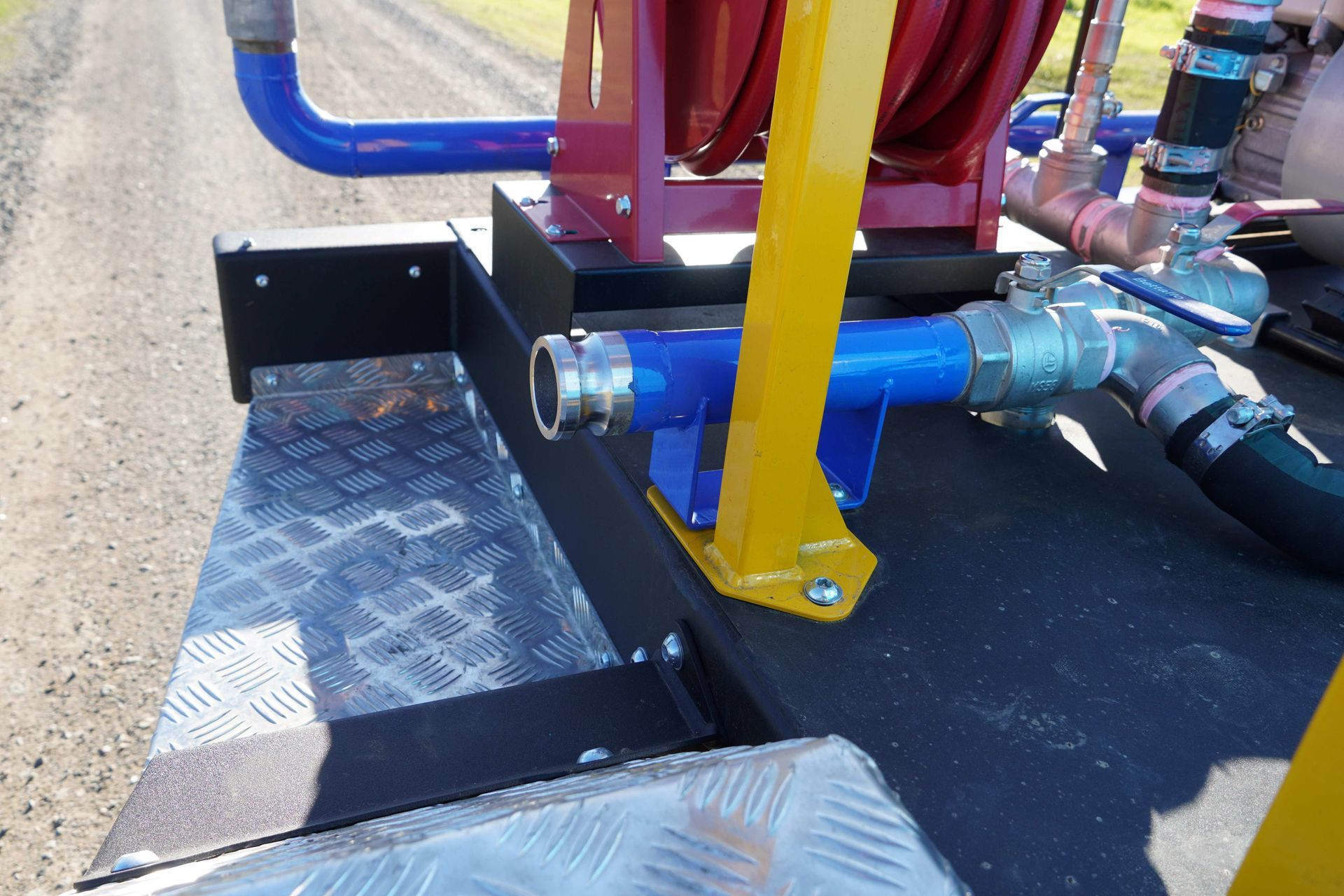 The 2-inch pump outlet situated at the side of the water trailer. 