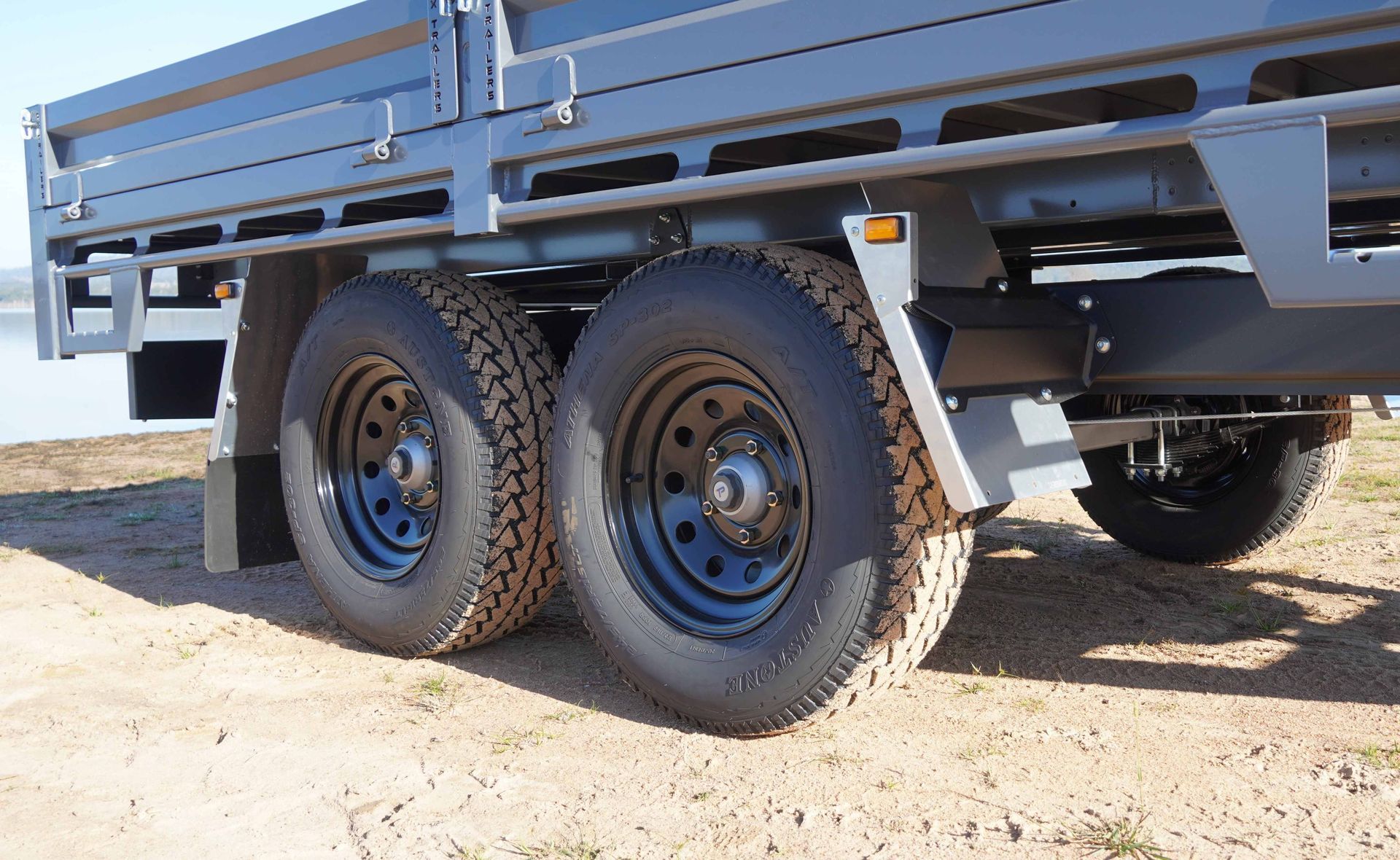 The tandem tyres and wheels of the Flat Top Trailer